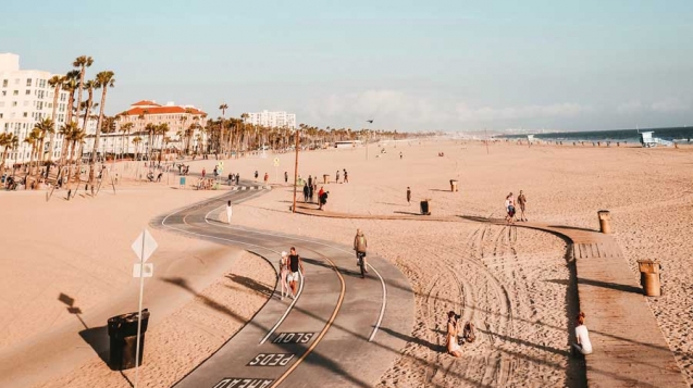 Cycling The Strand bike path at Santa Monica Beach, Los Angeles